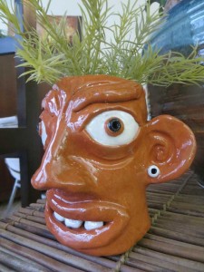 This friendly guy will hold you favourite plant or herbs!