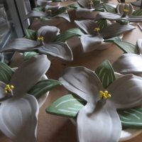 table of white trilliums hand made by volunteers