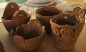 hand built greenware examples of students' work