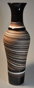 marbled red, white & black clay tall thrown vase