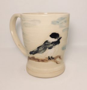 Tall white mug with painting of a chickadee - Dorothy Meddows-Taylor