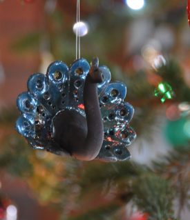 Peacock raku ornament by Heathyr Francis