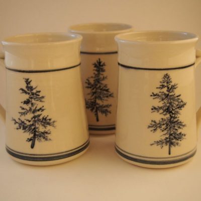White porcelain mugs with blue brushwork white pines - Priya Harding