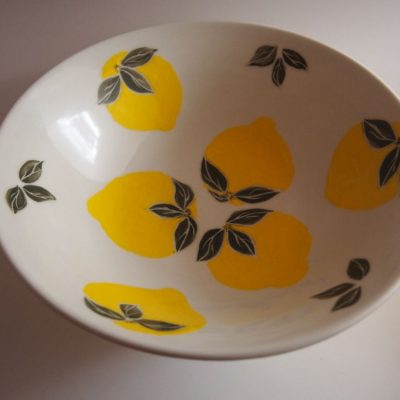 White porcelain bowl painted with yellow lemons & green leaves - Priya Harding