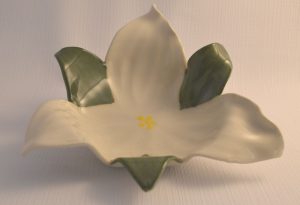 Hand built bowl in the shape of a white Trillium with green leaves
