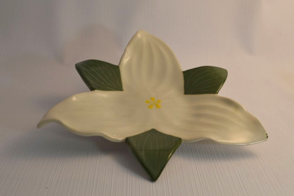 Hand built plate in the shape of a white Trillium with green leaves