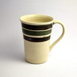 white mug banded with three green stripes and dots - Maureen Reed