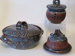 Blue carved covered casserole, blue & bark garlic keeper and blue and bark butter dish - Anne Young