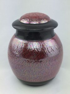 Lidded jar with exterior decorative cracking glazed in a pearlescent red - Darlene Malcolm-Moran