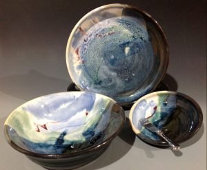 plate and bowls in black and blue glaze - Lillian Forester