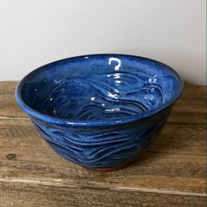 Carved bowl glazed in a rich blue - Sara Purves