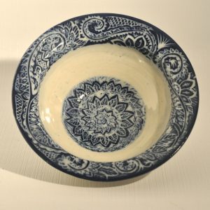 Bowl painted with cobalt blue and carved through in swirling lines - Karina Bates
