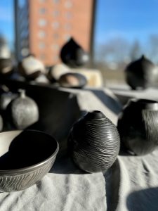 photo of black polished pit fired pots by Dan Ferguson