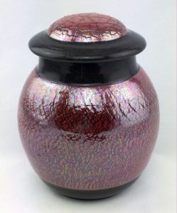 Black jar with lid and red lustre glaze over decoratively cracked body - Darlene Malcolm Moran