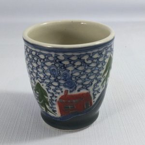 colourful tumbler carved with cottage scenes - cathy allen