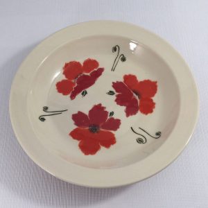 white porcelain serving platter painted with red poppies - Priya Harding