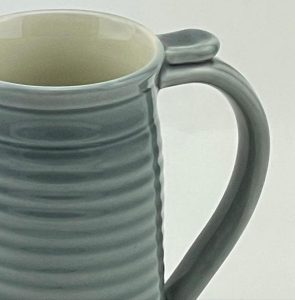 Large teal grey mug with thumb rest and throwing lines. White inside. Darlene Malcolm-Moran